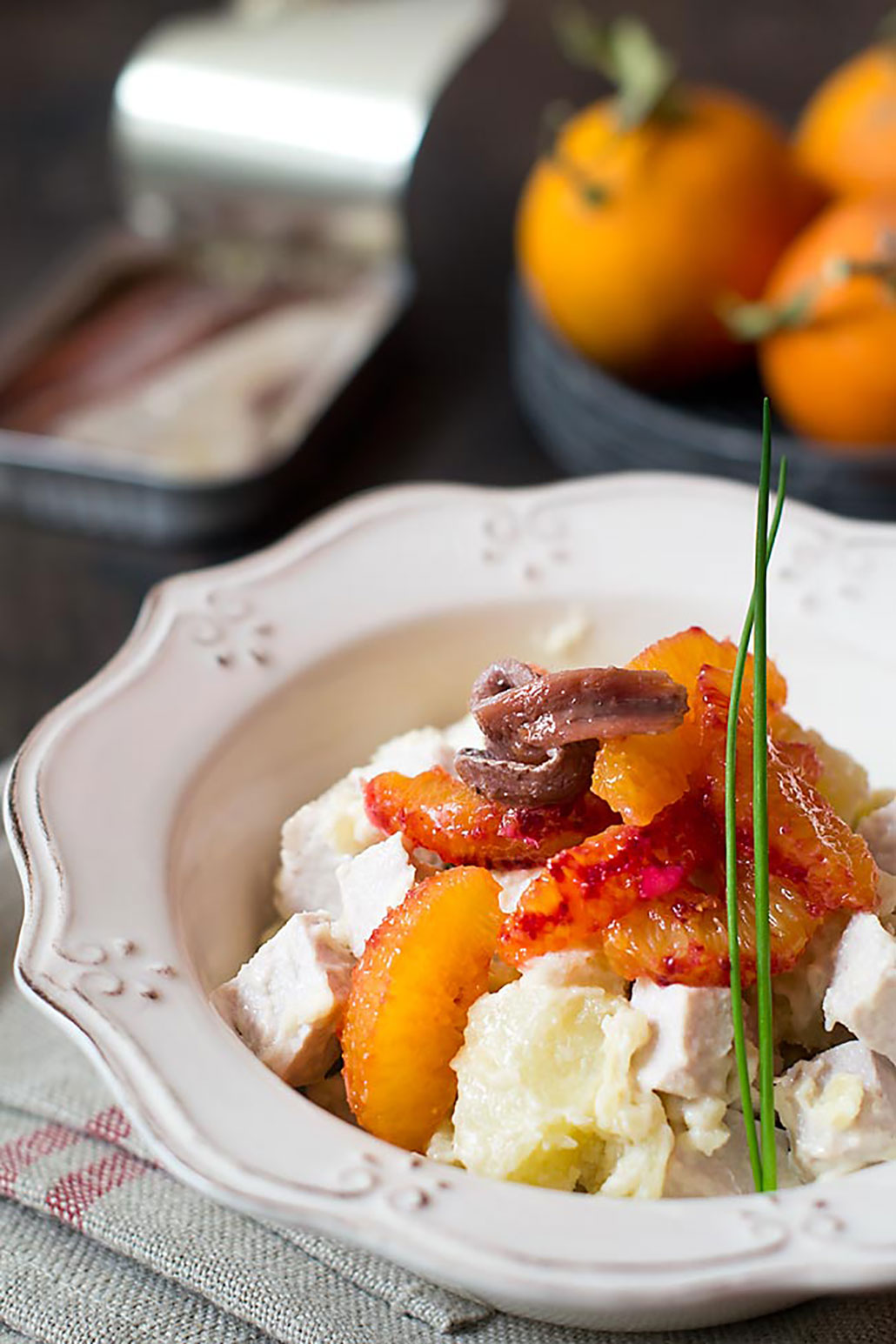 Ensalada anchoas, naranja y lomo